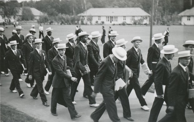 AMERICANS ARRIVING AT VILLAGE WITH CORNELIUS